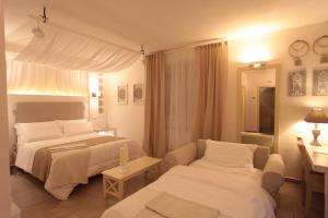 Letto o letti in una camera di Relais in Contrada