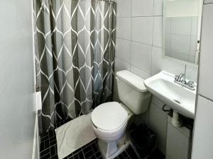 Koupelna v ubytování Departamentos H72