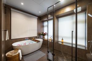 Koupelna v ubytování Guangzhou He She Art Apartment