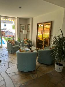 Posezení v ubytování Hotel Hofmann Zur Mühle
