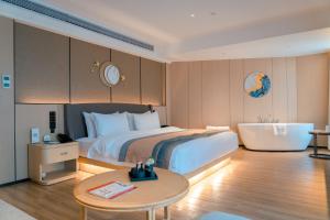 Letto o letti in una camera di 桂林桂花树下酒店 Guilin Osmanthus Tree Resort