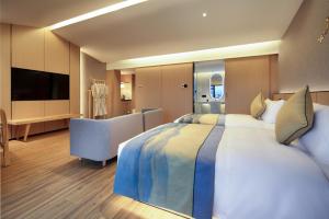 Letto o letti in una camera di 桂林桂花树下酒店 Guilin Osmanthus Tree Resort