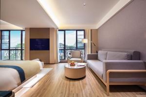Area soggiorno di 桂林桂花树下酒店 Guilin Osmanthus Tree Resort