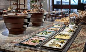 a buffet with many different types of food on display at Holiday Inn Resort Bali Canggu by IHG in Canggu