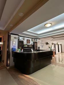 Ο χώρος του λόμπι ή της ρεσεψιόν στο Shanyrak Hotel