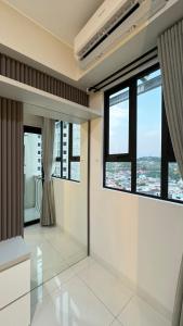 Fotografie z fotogalerie ubytování Corner High floor 2BR apartment Batam v destinaci Nagoya