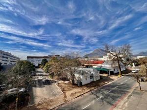 an overhead view of a street with buildings and trees at Escape to 205 in Stellenbosch central-free parking in Stellenbosch