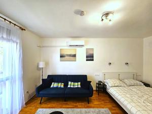 Postel nebo postele na pokoji v ubytování Barcika Apartman