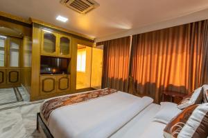 Voodi või voodid majutusasutuse Gorakha Hotel toas