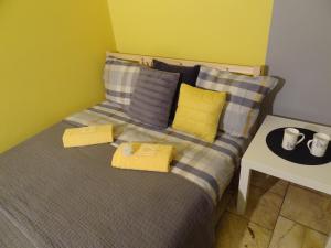 Posteľ alebo postele v izbe v ubytovaní Apartamenty Polna