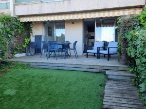 Un jardín fuera de Face au port - Vue mer - Jardin - Wifi - Ménage - 4 pers