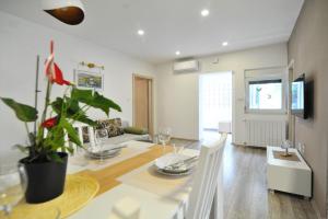 TV a/nebo společenská místnost v ubytování M&M apartments