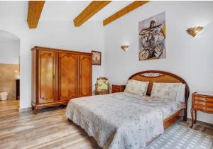 Postel nebo postele na pokoji v ubytování Domaine L'Helion