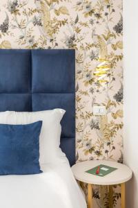 Letto o letti in una camera di Romi Suite