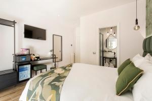 Letto o letti in una camera di Romi Suite