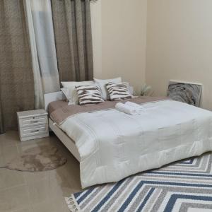 Krevet ili kreveti u jedinici u okviru objekta Escape to comfort properties