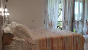 Posteľ alebo postele v izbe v ubytovaní Como Petite Maison