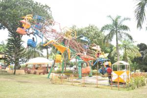 a playground with a bunch of different types of slides at Fun City Water & Theme Park in Dar es Salaam