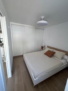 Ένα ή περισσότερα κρεβάτια σε δωμάτιο στο vivienda independiente +7 φωτογραφίες