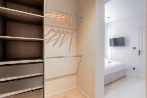 Postel nebo postele na pokoji v ubytování Spacieux T3 moderne avec parking, Ecully