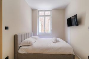 Postel nebo postele na pokoji v ubytování Spacieux T3 moderne avec parking, Ecully