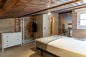 Posteľ alebo postele v izbe v ubytovaní AB Poble Nou Venero