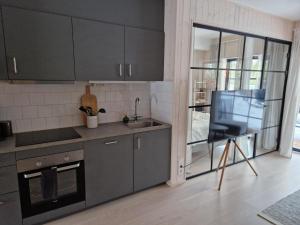 Lindvallen Ski In Söderåstorget的厨房或小厨房