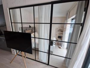 Lindvallen Ski In Söderåstorget的电视和/或娱乐中心