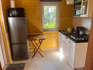 Kuchyň nebo kuchyňský kout v ubytování Katase Tiny House