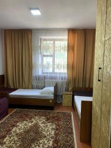 Postel nebo postele na pokoji v ubytování Bozui Hostel + 17 fotografií