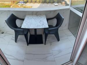 Un lugar para sentarse en Golem Apartment Luxury 7 fotos más