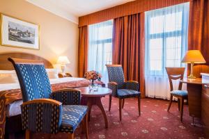Łóżko lub łóżka w pokoju w obiekcie Spa Resort PAWLIK-AQUAFORUM