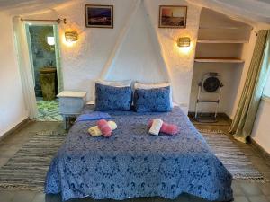 Letto o letti in una camera di Palais d'hôtes