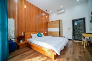 Postel nebo postele na pokoji v ubytování Coto Center Homestay + 37 fotografií