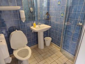 Koupelna v ubytování Holms Motel Larvik + 13 fotografií