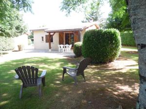 En have udenfor Le Pinot - Gîte - Lot - Vallée de la Dordogne + 2 billeder