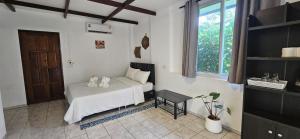 Letto o letti in una camera di Koh Mak Garden View