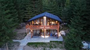 an overhead view of a house in the woods at Bujtina Arturi in Valbonë