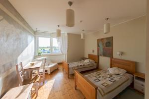 Postel nebo postele na pokoji v ubytování Altmõisa Guesthouse