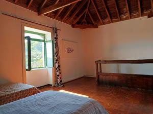 Postel nebo postele na pokoji v ubytování Vv Rural Finca Ecocielo + 13 fotografií