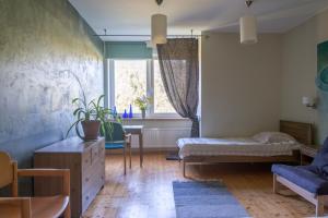 Postel nebo postele na pokoji v ubytování Altmõisa Guesthouse