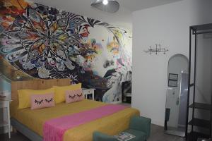 Posteľ alebo postele v izbe v ubytovaní Huelva Art