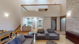 Posezení v ubytování High1 Condominium