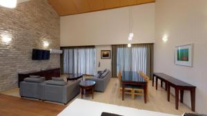 Posezení v ubytování High1 Condominium
