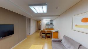 TV a/nebo společenská místnost v ubytování High1 Condominium