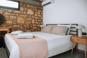 Postel nebo postele na pokoji v ubytování Manolis Seaside Villa + 31 fotografií
