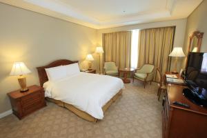 High1 Grand Hotel Main Tower的电视和/或娱乐中心