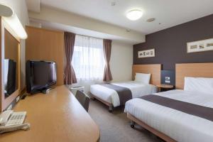 TV a/nebo společenská místnost v ubytování Comfort Hotel Yokohama Kannai