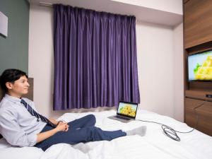 TV a/nebo společenská místnost v ubytování Comfort Hotel Yokohama Kannai