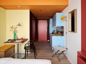 Kuchyň nebo kuchyňský kout v ubytování Dahei Apartment Hotel